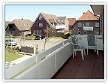 Balkon mit Blick Grnflche und Dnenkette